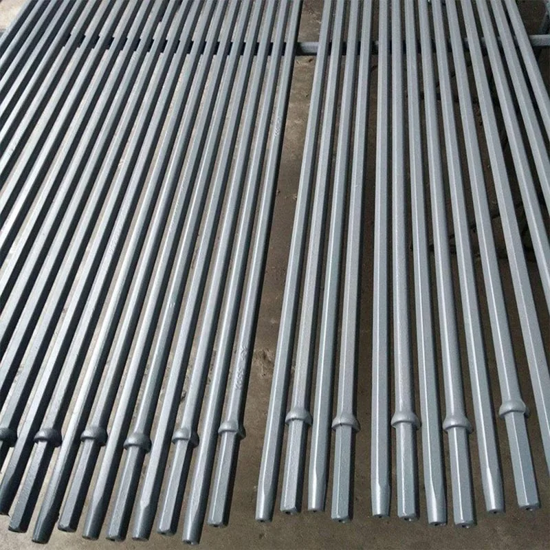 Top hammer drill rod